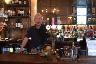 Image of Malcolm at the Bar